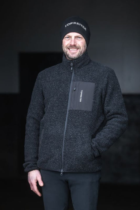 Top Reiter Glampi Unisex Wolljacke, Schwarz