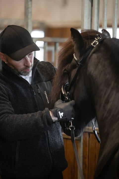 Top Reiter Glampi Unisex Wolljacke, Schwarz